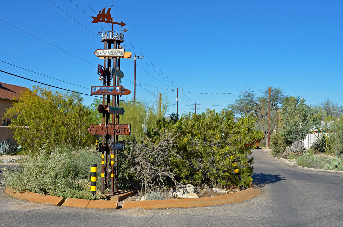 Dunbar/Spring neighborhood traffic circle with sign art